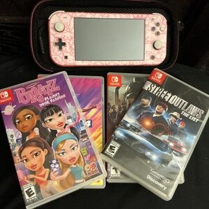 Pink Nintendo Switch Lite w/ Case And Games